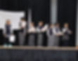 Sathya Sai students on stage at Children Helping Children event