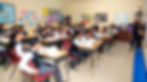 Sathya Sai school students in class with teacher